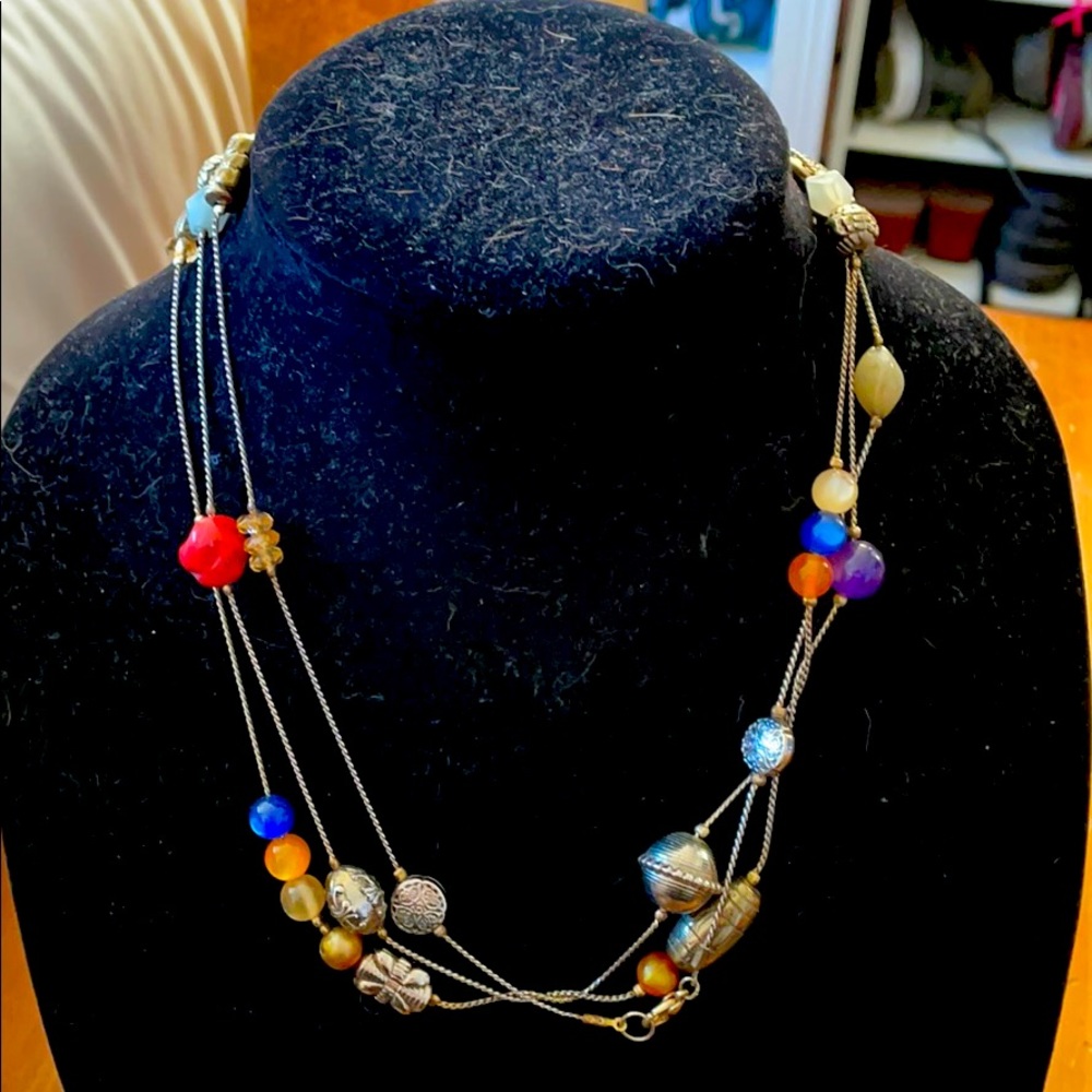Chico’s multi-colored 60” gold-tone necklace.